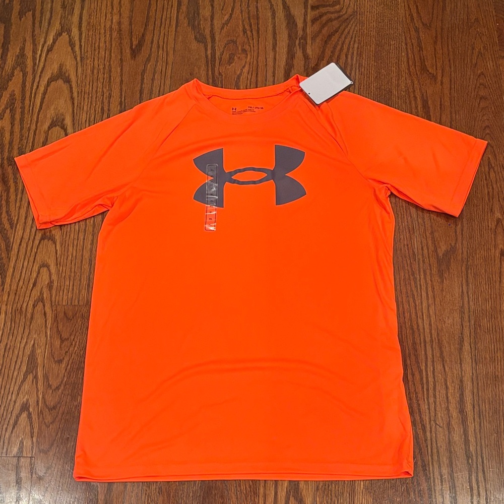 Under Armour boys Dri- fit tee. XL. Orange with grey logo.